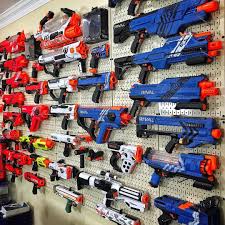 So i went on the hunt for ideas and found some nerf gun wall options. Nerf Gun Display Rack Nerf Storage Organization Ideas For Blasters Accessories The Rack Has Storage For Most Types Of Nerf Guns From Pistols To Rifles Goexhjjn