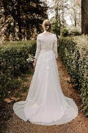 Now Available In Our Yuba City Store Book Now A E Bridal Modest Wedding Dresses Yuba City North Wedding Dresses Warm Wedding Dress Modest Wedding Dresses