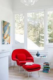 Give your living room a splash of bright color by pairing a red accent chair with your sofa or sectional. Here S What Your Favorite Modern Chair Says About You Accent Chairs For Living Room Red Accent Chair Living Room Decor Apartment