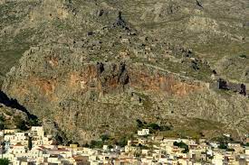 Has been tentatively and inconclusively compared with χᾰ́ος (kháos, empty space, abyss, chasm) as well as χατέω (khatéō, to lack, miss, need, desire); Megalo Kastro Ths Xwras Kalymnoy Bikipaideia