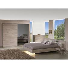 Des chevets intégrés rétractables et 2 grands tiroirs pour le côté pratique, une ligne sobre et des couleurs chic pour l'allure. Armoire De Chambre Armoire De Chambre Å Coucher Les Armoires De Chambres Å Coucher Armoire De R Bedroom Furniture Design Simple Bedroom Design Home Decor
