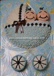 Homemade Baby Shower Carriage Cake I Like The Way The M S Make A Cute Design And The Cute Baby Baby Shower Cakes For Boys Baby Shower Cupcakes Shower Cupcakes