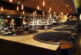 Cool bar seating and bar. The Coolest Bars And Restaurants In Town Bar Design Restaurant Restaurant Booth Seating Restaurant Decor