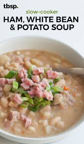 This Hearty Soup Is Good In The Belly And Good On The Wallet Potatoes Softened In The Slow Cooker M Ham And Bean Soup Homemade Soup Recipe Ham And Potato Soup