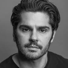 Alan Tudyk reflected