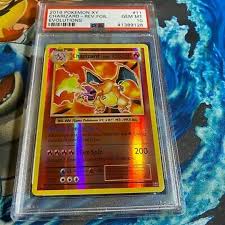 Sent 1st class recorded in a plastic top loader for protection. Mavin 2016 Charizard Reverse Holo Rare 11 108