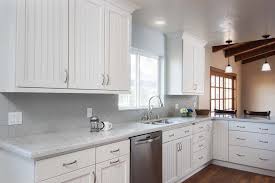Don't ever install a counter flush with the cabinet in a kitchen or bath remodel. Home Improvement Archives White Kitchen Remodeling White Quartz Countertop White Modern Kitchen