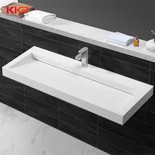 Ideally, one person should be below the countertop to help guide and center the sink, while the other person works from above. China Kingkonree Various Design Corian Solid Surface Bathroom Custom Bathroom Countertop Basin Vanity Sink China Wash Basin Solid Surface Basin