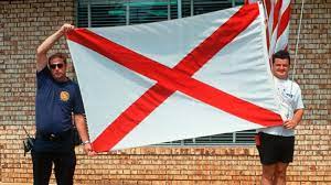 Flag of alabama state consists of a crimson cross on white background. How Other Southern States Flags Also Evoke The Confederacy Abc News