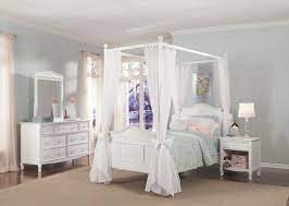 You can recognize them easily by the flowing drapes. White Canopy Bed Emma Collection Full Size Poster Canopy Bed In White Comfortla Com Girls Bed Canopy White Canopy Bed Girl Beds