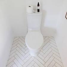 White Herringbone Bathroom Floor Tiles Design Decor Photos Pictures Ideas Inspiration Pai Bathroom Flooring Herringbone Floor Herringbone Tile Bathroom