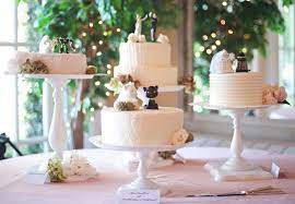13 Tips For A Tempting Cake Table Wedding Cake Display Multiple Wedding Cakes Wedding Cake Table