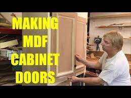 Assuming you'e talking about 3/4 mdf, biscuits with glue will work fine. Making Mdf Cabinet Doors Woodworking Youtube