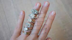 diamond size chart on hand engagement rings on finger