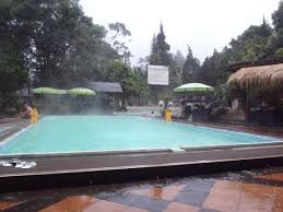 The Main Swimming Pool In The Hotel Complex During Some Rain Foto Sari Ater Hotel Bandung Tripadvisor