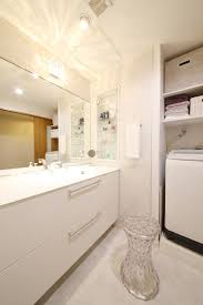 上品な高級感を演出 エレガントな水廻りリフォーム toto 洗面台 洗面所 タイル おしゃれ 浴室 デザイン