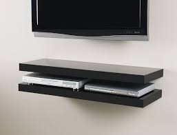 Pin Op Tv Zone An additional media equipment shelf rests above the firebox and is complete with convenient back wall cord access.