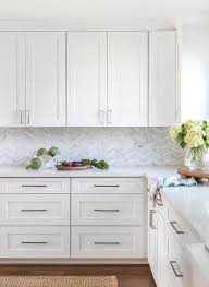 These are the top kitchen backsplash tile trends for 2021. Glossy White Herringbone Backsplash Tiles Design Ideas