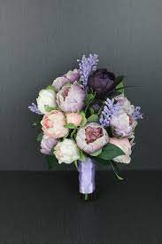 White wedding flowers are effortlessly elegant. A Purple Peony Wedding Bouquet Artificial Wedding Bouquets Peony Bouquet Wedding Peonies Bouquet Purple
