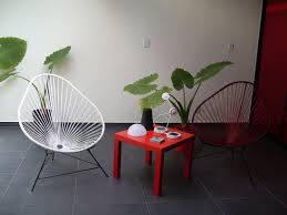 Acapulco Chair An Ideal All Weather Outdoor Wicker Patio Chair In 2020 Wicker Patio Chairs Acapulco Chair Living Room Storage