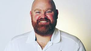 Norcross joins Commodore staff as offensive line coach