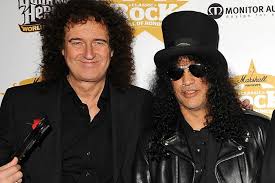 The brian may guitar is faithful to the spirit of brian's original 'red special', an instrument that has achieved iconic status and a unique place in rock history, and designed by brian may himself. Brian May And Slash Team Up To Save Badgers