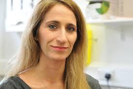 Woman thanks surgeon who reset her jaw after childhood bike crash left it  'skewed'