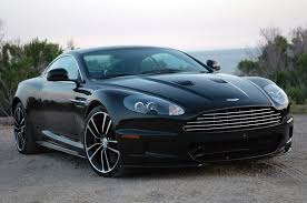 Review Aston Martin Dbs Carbon Black Devours Suns Spits Them Out Aston Martin Dbs Aston Martin Aston