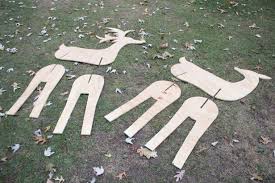 The candies get transferred onto the thinner piece of plywood. How To Build Wooden Deer For Outdoor Decor Hgtv