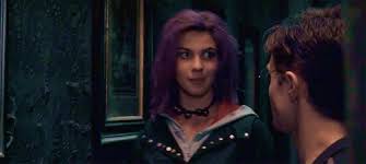 Why did Tonks wink at Harry?