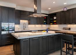 Portable this kitchen island with stove top blends stoned granite top and polished wood base together. How To Choose A Range Hood For Your Kitchen Remodel Or New Kitchen
