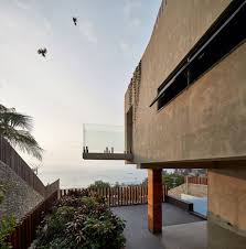 Seitenansicht Terrasse Balkon Absturzsicherung Fallschutz Glas Meeresblick Pflanzen Betonwand Saule Klinkerriemchen Fassade Architekt Design Design Fur Zuhause