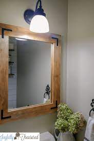 Our add a frames® adhere directly to the surface of your mirror, so they will install easily if your mirror is against a wall or is resting on a backsplash. Diy Wood Frame Mirror Farmhouse Industrial Bathroom Mirror Joyfully Treasured
