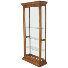Touch latch hardware on all doors. Narrow Glass Display Cabinet 1 For Sale On 1stdibs