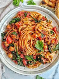 Roasted Tomato Spaghetti With Spinach And Chickpeas Munchmeals By Janet Recipe In 2021 Spaghetti With Spinach Roasted Tomatoes Yummy Pasta Recipes