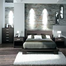 The soft black paint color in this bedroom makes it feel special and intimate in ways you'd never be able to achieve fluffy high quality white bedding is a great way to soften out the darkness of black paint. Bedroom Designs Red Black Bedroom Design