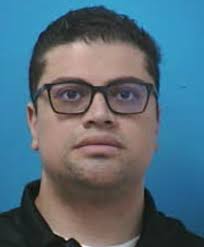 Officials said four children were swimming in the lake and began struggling  as the wind and waves picked up.