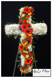 We deliver your flower message wherever and whenever. Colorful Serpentine Sympathy Cross In Santa Fe Springs Ca Le Fleur Floral Couture