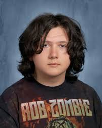 Hey y'all! Would anyone be able to remove the piece of hair that's  stretched across my son's forehead? Thank you!