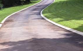 If the edges of an asphalt driveway are not dressed, they become susceptible to cracking and breaking off. Not Just For Looks 8 Benefits Of Driveway Edging Bayside Pavers