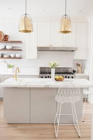 Look for pendants or flush mounts with minimal design elements, such as geometric patterns, clean lines, and thin structures. Brass Pendants Wire Dome Pendants Rejuvenation Pendants Haleigh Pendants Brass Haleigh Pendants Kitc Kitchen Design Kitchen Remodel Small Kitchen Interior