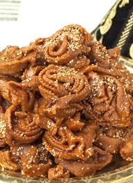 Try Your Hand At Making Moroccan Chebakia Mkharka These Sticky Sweet Fragrant Treats Are Popular In Ramadan A Sesame Cookies Moroccan Cookies Moroccan Food