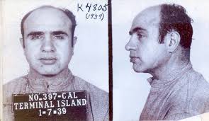 85 years ago today, Al Capone's mug shot was made upon his swift transfer  to San Pedro's Terminal Island from Alcatraz. This photo shows a man who  basically was a shell of