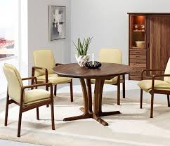 Danish round extendable teak dining table 1960s. Traditional Round Dining Room Table Wharfside Danish Furniture