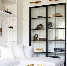 Black Steel Glass Cabinet Doors Jessica Devlin Design In 2020 Living Room Glass Cabinet Bookshelves Built In Bookcase With Glass Doors