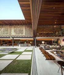 While the heart of the home is thought to be the kitchen, isn't it fair to say the living room is where we spend the most time relaxing? L Shaped House By Jacobsen Arquitetura On Behance