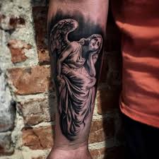 They tend to be very symbolic and amazingly elegant. 60 Amazing Angel Tattoo Designs For Men Best Angel Tattoos Men S Style