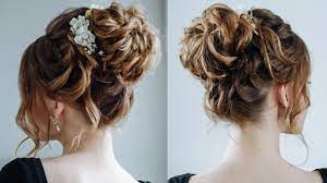 High Curly Messy Bun The Topknot Updo Messy Curly Bun High Bun Hairstyles Curly Hair Styles