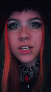 Explore the Alluring Vampiress Emma's Flirtatious Side