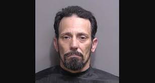 Man Arrested, Bomb Squad Searches Unit at Palm Condominiums